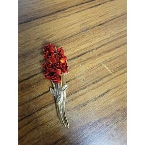 DM 97 TWELVE DOZEN ROSES GOLD TONE BROOCH PIN AVON
